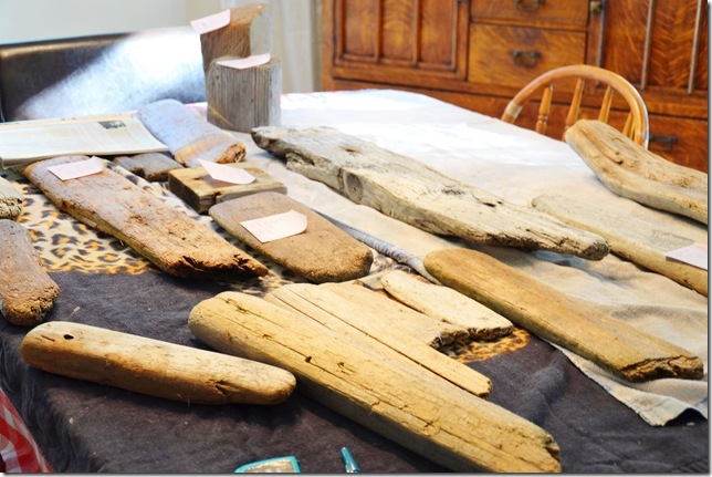 driftwood pieces laid out on a table