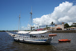 A boat to recife da fora, a reef, porto seguro.