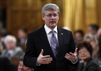 Prime Minister Harper speaks during Question Period in the House of Commons. The Harper administration has silenced government scientists by forbidding them to speak with press. Chris Wattie / REUTERS