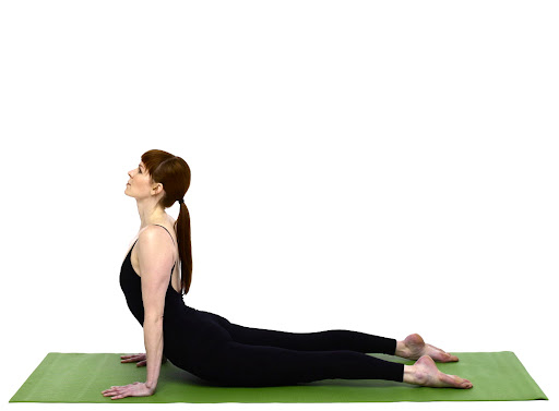 As you finish the wave, lower your hips to the floor, point you feet, and raise your chest into an Updog pose. Keep shoulders over wrists, and keep lifted. Then return to Downdog and repeat!