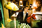 Colman and Katie paused for a photo through the large fish tank. Colman and Katie paused for a photo through the large fish tank.