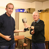 Derek Newport wins the Mercer Cup trophy as the runner with the most improved handicap times