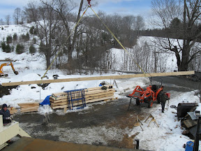 A forty foot plate is flown into place.