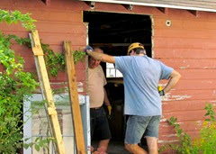 1409235 Sep  20 Terry Mark Discussing Door Frame