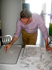 Design director, Michael McCormick, begins to map out the design of the necklace before it is applied to the cake. Design director, Michael McCormick, begins to map out the design of the necklace before it is applied to the cake.