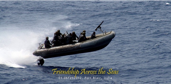 Commandos of the Indian Navy, the MARCOS, lifted off the water, charging ahead aboard their rigid-hull inflatable boat.