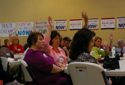 Audience members respond to the question 