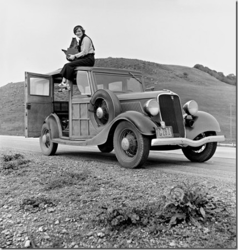Dorothea Lange on Top of a Car