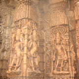 There is one child, trying to climb the feet of the apsara, shown in between these two images.