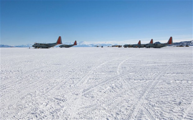 Airplanes on Airfield, Ross Ice Shelf, Antarctica. Researchers say that global warming has caused the glacial ice on the runway to turn to mush just four years after it was built for about &pound;30 million. ALAMY