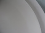 It's hard to see in this photo, but these Donna Karan plates have a mix of matte and glossy finishes.