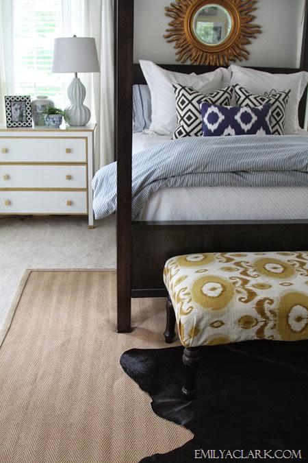 layered sisal and cowhide rugs