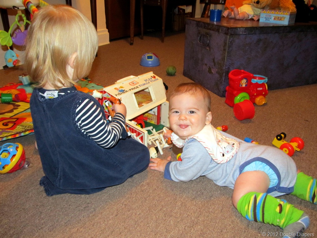 [Nolan%2520%2526%2520Elaine%2520playing%2520Little%2520People%2520Farm.jpg]