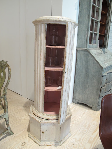 Isn't the interior of this unique cabinet beautiful?