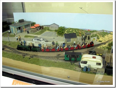 This 0n9 model combines "N" gauge track and chassis's with "0" gauge size bodies and figures.