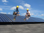 Partner Dan Creighton and Jason Wamboldt installing a 2 kilowatt arrary for a local home builder in 2007.