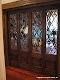 Leaded beveled diamond doors.