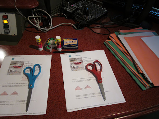 All you need for this simple craft is construction paper, scissors, toothpicks, tape, and a marker.
