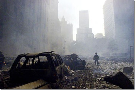 tn_A_firefighter_walks_amid_rubble_near_the_base_of_the_destroyed_World_Trade_Center_in_New_York_on_September_11__2001
