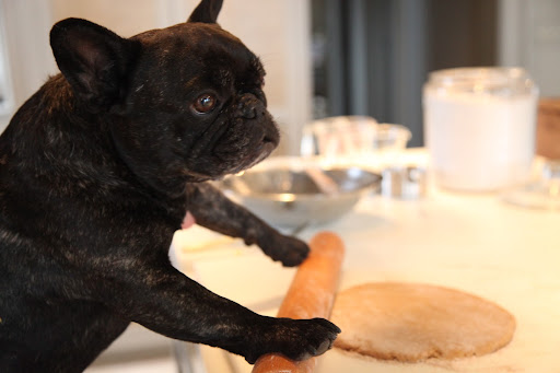 Now, I'll roll out the dough to a 1/2