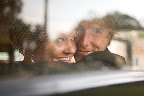 The happy couple look out the back as they leave their ceremony--married. The happy couple look out the back as they leave their ceremony--married.