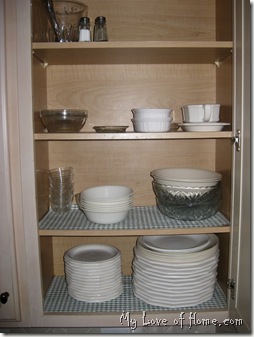 organized cabinet, white dishes