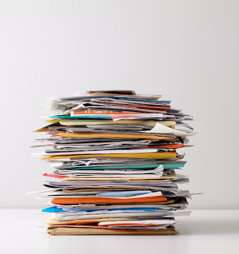 Get in the habit of sorting the mail as soon as you bring it inside.  Doing it each day will only take a few minutes.