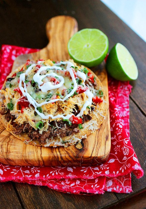 Baked Mexican Tostadas – Pile tasty toppings on these lighter Mexican tostadas with chicken, black beans and red peppers! | thecomfortofcooking.com