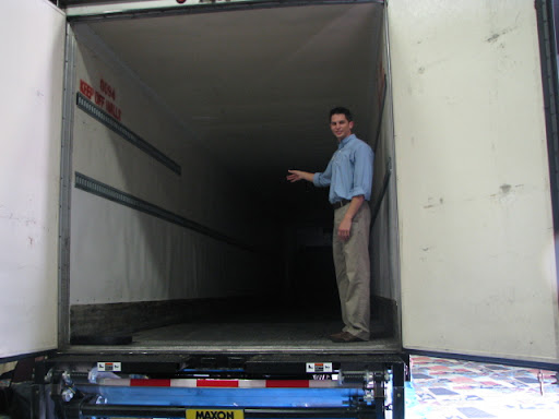 Ozarks Food Harvest Communications Coordinator Matt Petcoff explains that the new mobile unit is the orginization's first capable of refridgerated transport. (photo credit: Sam Senovich)