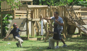 Run! Wilsenci and Bernito race to the towel.