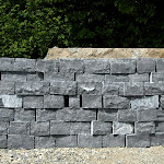 Dry stone wall of squared rubble stones