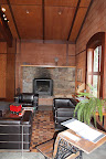 In the corner of the tasting room lies this sophisticated oasis. If you had a late fall wedding, it'd be wonderful to have after-dinner drinks of hot cocoa or cider, and light a roaring fire. In the corner of the tasting room lies this sophisticated oasis. If you had a late fall wedding, it'd be wonderful to have after-dinner drinks of hot cocoa or cider, and light a roaring fire.
