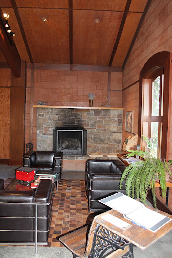 In the corner of the tasting room lies this sophisticated oasis. If you had a late fall wedding, it'd be wonderful to have after-dinner drinks of hot cocoa or cider, and light a roaring fire.
