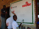 Ulusaba asked us (i.e. the Art Club) to paint the sponsorship sign for the new library, so Georg and Enock and a couple other boys helped and I was also lucky to have Robin (one of the new PCVs replacing us) help out a bit! South Africa - 479.jpg