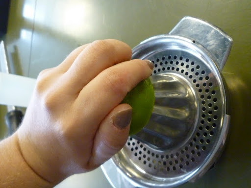 To get the citrus salad dressing started, Monty slices and juices two limes.