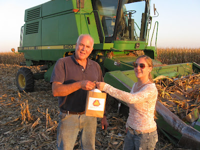 4-H’er and County Council member Shari Temple found Jay Crone combining in a corn field where he stopped for his “Stay Safe, Take a Break” bag. Photo courtesy: Washington County Extension. 4-H’er and County Council member Shari Temple found Jay Crone combining in a corn field where he stopped for his “Stay Safe, Take a Break” bag. Photo courtesy: Washington County Extension.