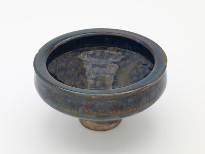 Bowl | Origin:  Iran | Period: late 14th century  Il-Khanid period | Details:  Not Available | Type: Stone-paste decorated with lustre over deep blue glaze | Size: H: 11.4  W: 21.4  cm | Museum Code: F1909.313 | Photograph and description taken from Freer and the Sackler (Smithsonian) Museums.