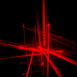 I felt a little creative tonight. I used a fogger and smoked out the restroom at the office, set the shutter speed to bulb and painted in the smoke with the laser. Laser Paint