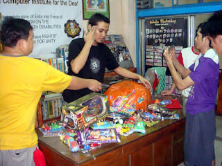 Faculty and students prepare the toys.