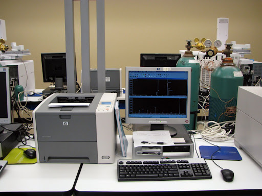 Computers used to identify the contents of evidence in the drug chemistry lab. (Photo credit: Jeremy Shreckhise)