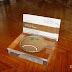 Square shaped acrylic paperweight & card holder with personalized gold plated medal. Your text and logos can be incorporated into the designs you choose. www.medalit.com - Absi Co
