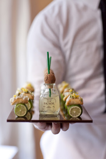 Mini tacos served with little Patron bottles.