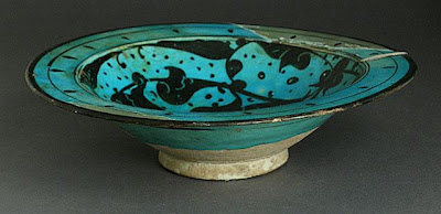Bowl | Origin: Syria | Period: late 12th-early 13th century | Collection: The Madina Collection of Islamic Art, gift of Camilla Chandler Frost (M.2002.1.75) | Type: Ceramic; Vessel, Fritware, underglaze-painted and incised, 2 7/8 x 10 5/8 in. (7.3 x 26.98 cm)