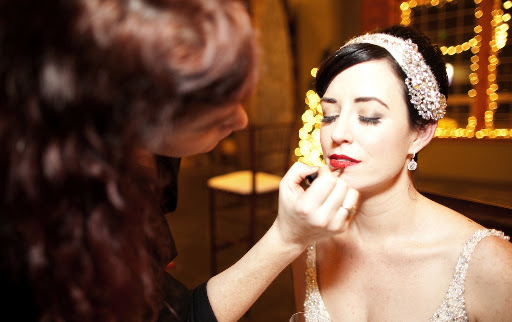 For the reception, Tiffany Lowry darkened my eye makeup and brightened my lip color. For the reception, Tiffany Lowry darkened my eye makeup and brightened my lip color.
