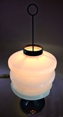 Heavy mid-century table lamp with a heavy lacquered metal base and acrylic shade