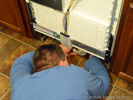 fixing the dishwasher