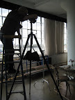 Photographer Patrick Farrell, taking a look through the camera.