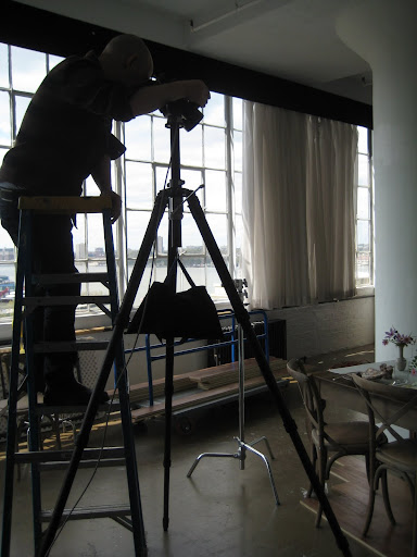 Photographer Patrick Farrell, taking a look through the camera.