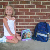 Kaitlyn is going to the Open Doors Learning Center at the United Methodist Church in Victoria.  Here she shows off her school equipment.
