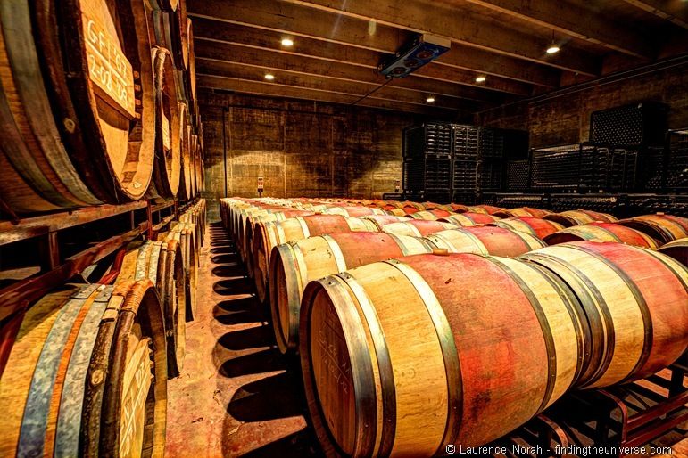 Row of wine barrels in cellar